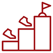 Outline of shoes ascending three steps toward a flag placed on the highest step, symbolizing progress or achievement.